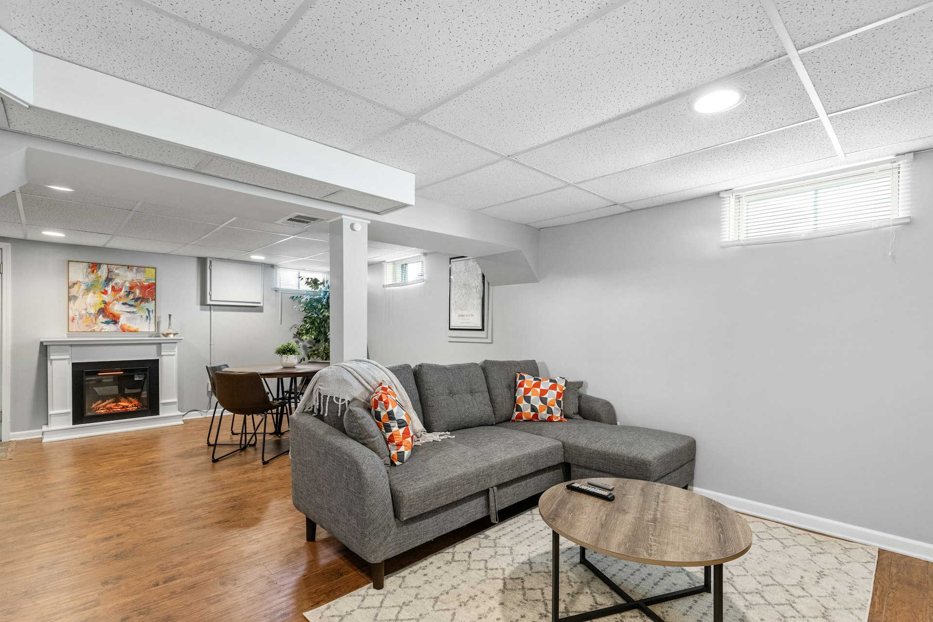 a living room filled with furniture and a fire place